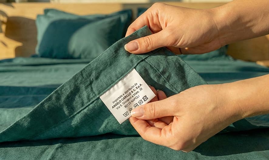 Come lavare e conservare un completo letto in cotone tinta unita